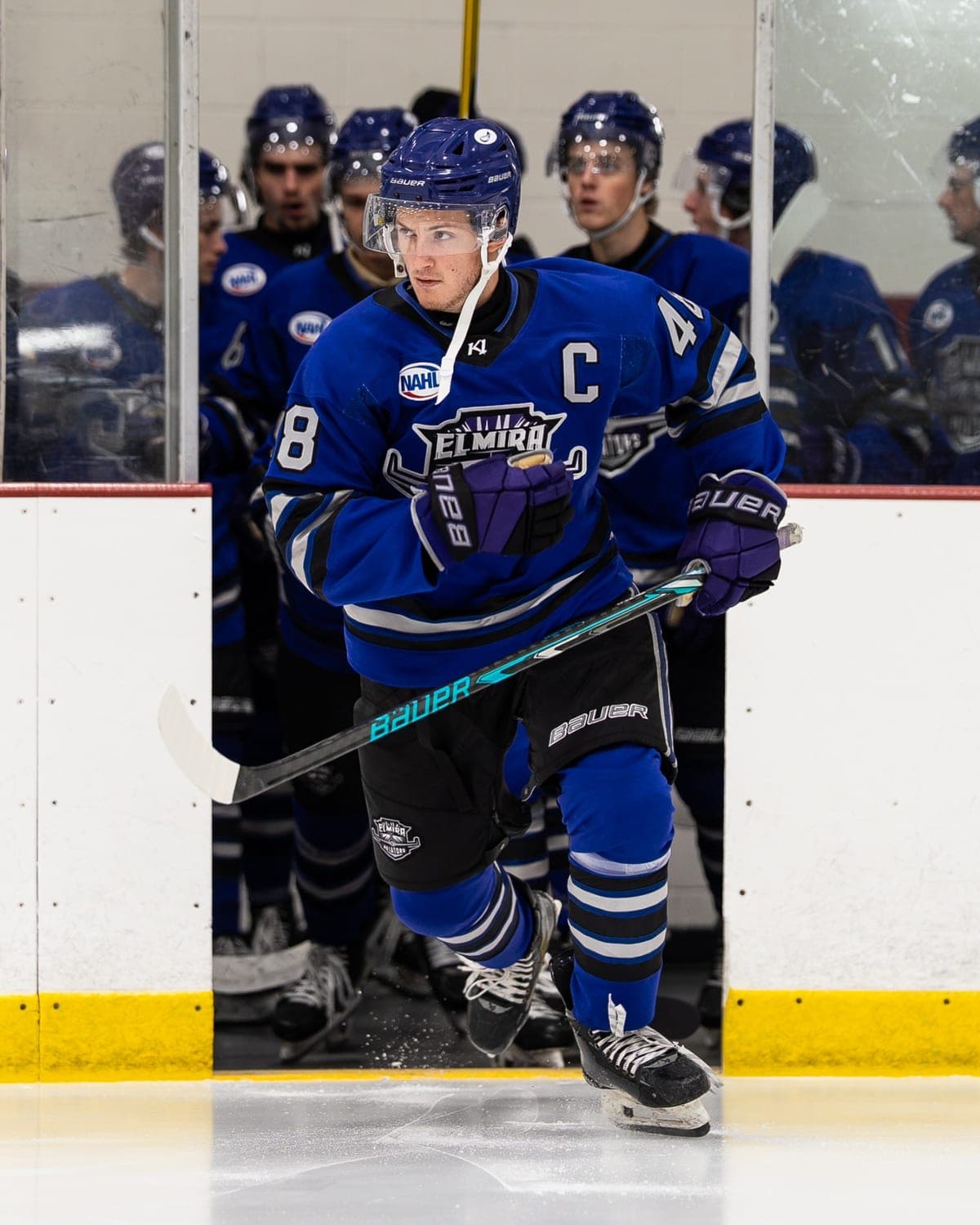 An Elmira Aviators player stepping onto the ice at the LECOM Event Center